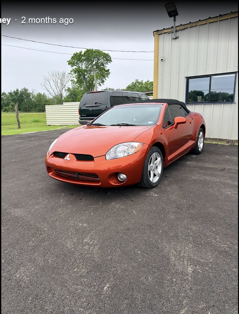 Mitsubishi Eclipse Spyder after repair at George's Body Shop